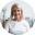 Profile photo of a person with a light blue background.